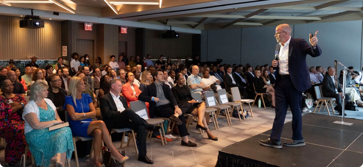 Energy Plus team presenting at an industry event
